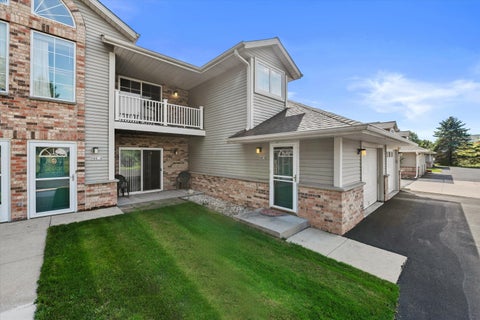 Photo of 702 Shepherds Dr, West Bend, WI 53090 (MLS # 1986846)