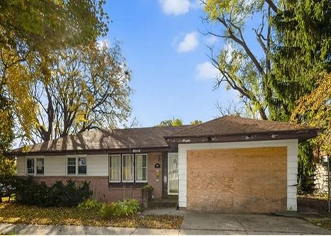 Photo of 7009 W Lancaster Ave, Milwaukee, WI 53218 (MLS # 1941255)