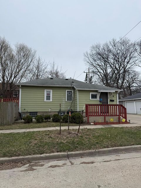 Photo of 6945 W Fond Du Lac Ave, Milwaukee, WI 53218 (MLS # 1955884)