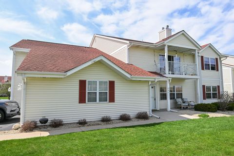 Photo of 683 Wood River Ct, West Bend, WI 53095 (MLS # 1958634)