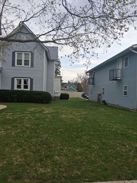 Photo of 1128 Wisconsin St, Lake Geneva, WI 53147 (MLS # 1957785)