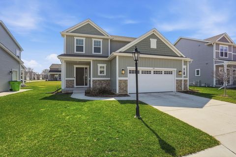 Photo of 547 Wild Oak Rd, Hartland, WI 53029 (MLS # 1957326)