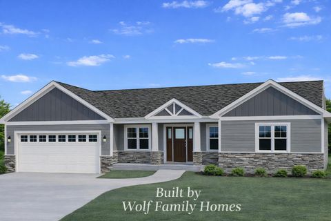 Photo of 322 Sandstone Dr, Slinger, WI 53086 (MLS # 1954553)