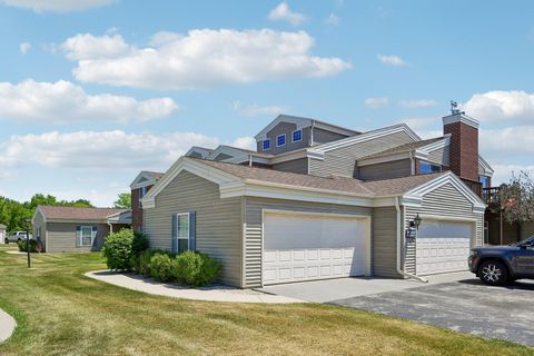 Photo of N16W26533 Tall Reeds Ln, Pewaukee, WI 53072 (MLS # 1964751)