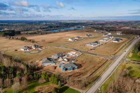 Photo of 514 W Talbots Woods Dr, Dousman, WI 53066 (MLS # 1965056)