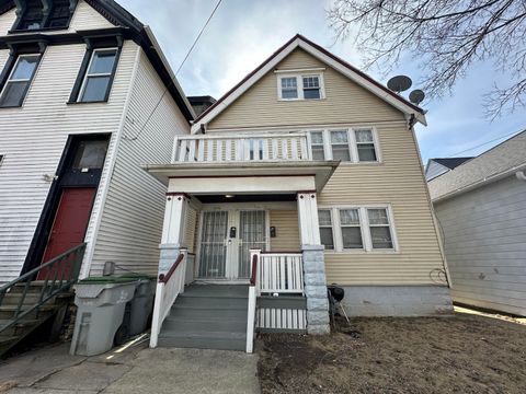 Photo of 313 E Garfield Ave, Milwaukee, WI 53212 (MLS # 1907479)