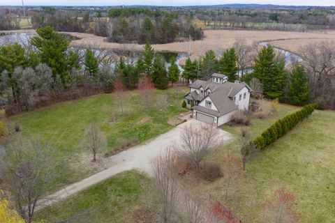 Photo of 760 Mill Pond Rd, Dousman, WI 53118 (MLS # 1957175)