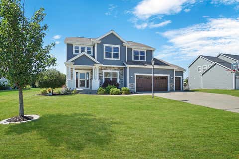 Photo of N60W13839 Weyerhaven Dr, Menomonee Falls, WI 53051 (MLS # 1974692)