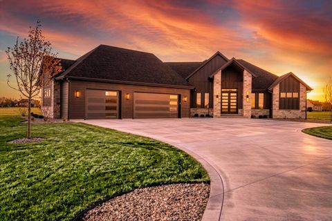 Photo of N67W34857 Ireland Dr, Oconomowoc, WI 53066 (MLS # 1960603)