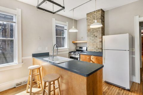 Photo of 1566 N Warren Ave, Milwaukee, WI 53202 (MLS # 1956476)