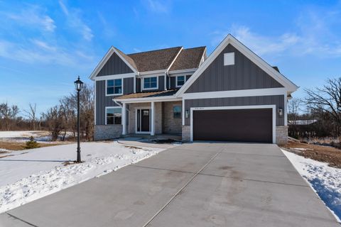 Photo of W192 N5472 Red Crown Ln, Menomonee Falls, WI 53051 (MLS # 1950139)