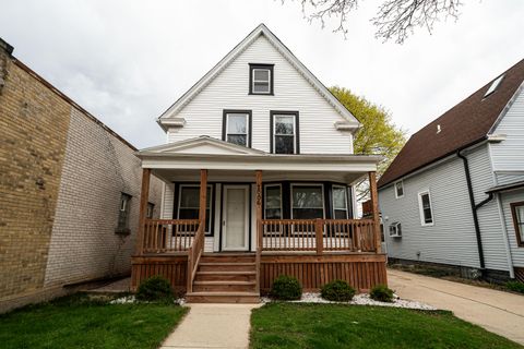 Photo of 2006 E Rusk Ave, Milwaukee, WI 53207 (MLS # 1958935)