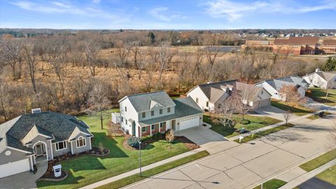 Photo of 227 Shore Cir, Oconomowoc, WI 53066 (MLS # 1945207)