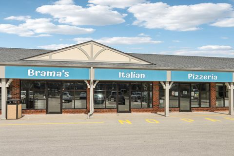 Photo of N112W16700 Mequon Rd, Germantown, WI 53022 (MLS # 1957234)