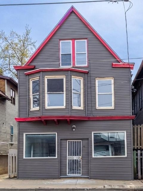 Photo of 935 W Greenfield Ave, Milwaukee, WI 53204 (MLS # 1948833)