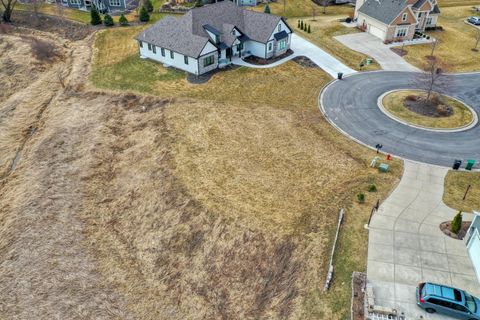 Photo of N57W19673 Holly Ct, Menomonee Falls, WI 53051 (MLS # 1953657)