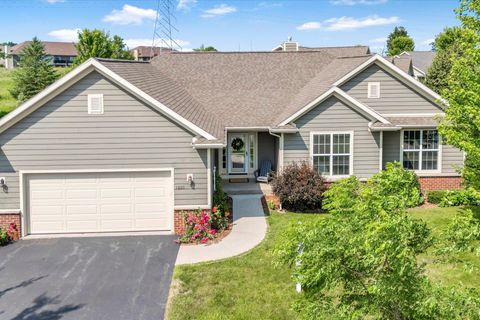 Photo of 1820 Misty Ridge Ln, Port Washington, WI 53024 (MLS # 1924775)
