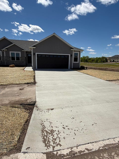 Photo of 123 Resort Dr, Johnson Creek, WI 53038 (MLS # 1965665)