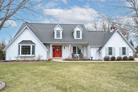 Photo of N51W16948 Fair Oak Pkwy, Menomonee Falls, WI 53051 (MLS # 1952064)