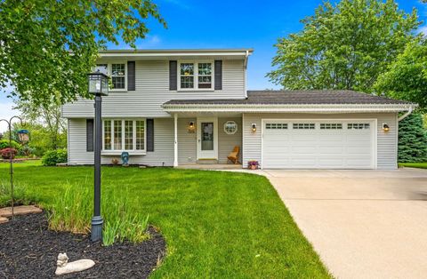 Photo of W143N4918 Brook Falls Dr, Menomonee Falls, WI 53051 (MLS # 1921943)