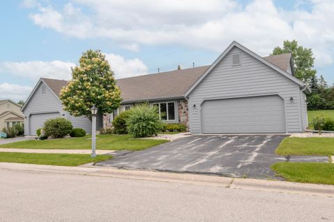 Photo of W178N9858 Riversbend Cir E, Germantown, WI 53022 (MLS # 1969346)