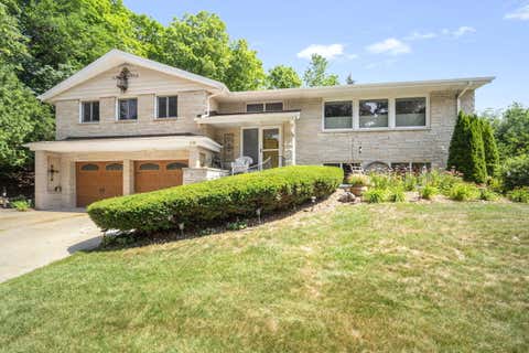 Photo of 818 E Badger Ln, West Bend, WI 53095 (MLS # 1971852)