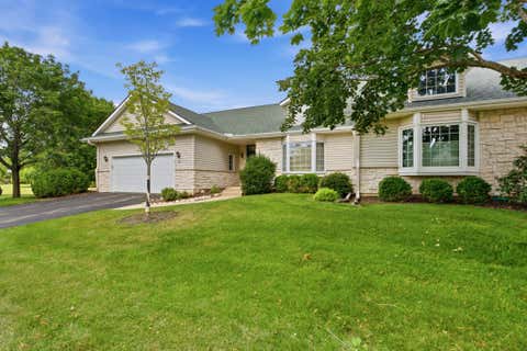 Photo of 291 Cardinal Ln, Hartland, WI 53029 (MLS # 1971043)