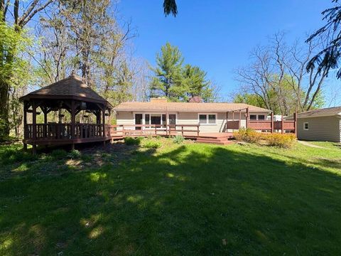 Photo of N55W30513 County Rd K Hwy, Hartland, WI 53029 (MLS # 1961390)