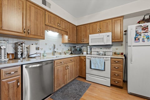Photo of 5166 S King Arthurs Ct, Greenfield, WI 53221 (MLS # 1985900)