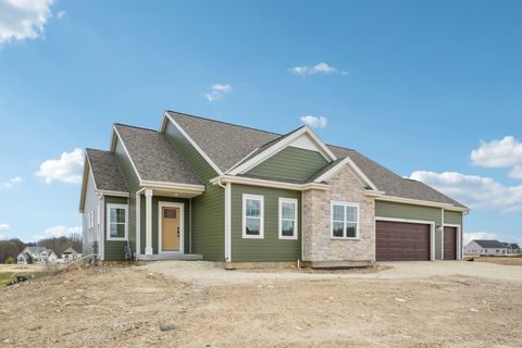 Photo of 438 Sandstone St, Slinger, WI 53086 (MLS # 1959716)