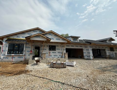 Photo of W389N7104 Pennsylvania St, Oconomowoc, WI 53066 (MLS # 1962922)