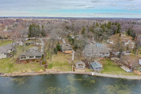 Photo of S106W20597 N Shore Dr, Muskego, WI 53150 (MLS # 1956769)