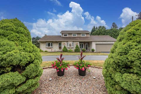 Photo of S94W14409 Groveway Ln Ln, Muskego, WI 53150 (MLS # 1973552)