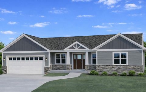 Photo of 322 Sandstone Dr, Slinger, WI 53086 (MLS # 1965893)