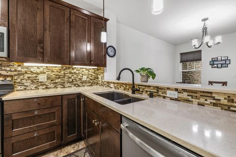 Photo of N17W26475 Meadowgrass Cir, Pewaukee, WI 53072 (MLS # 1951328)