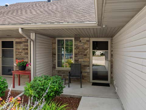 Photo of 537 Mapleleaf Ct, Manitowoc, WI 54220 (MLS # 1974386)
