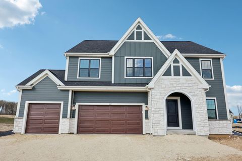 Photo of 447 Sandstone St, Slinger, WI 53086 (MLS # 1959711)