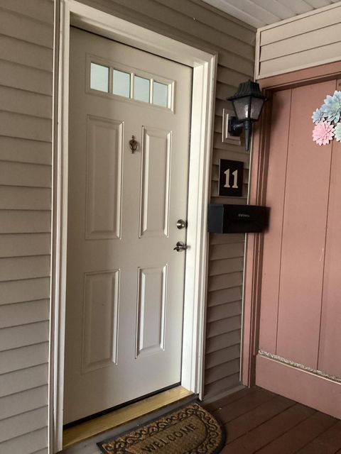 Photo of 11946 W Mill Rd, Milwaukee, WI 53225 (MLS # 1947318)