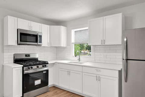 Photo of 8208 W Keefe Ave, Milwaukee, WI 53222 (MLS # 1975150)