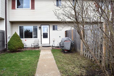 Photo of W165N11547 Abbey Ct, Germantown, WI 53022 (MLS # 1956612)