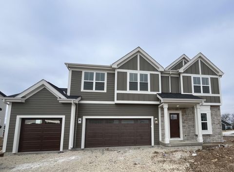 Photo of W149N11883 Red Holly Dr, Germantown, WI 53022 (MLS # 1951238)