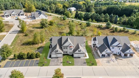 Photo of 1830 Woodland Way, Slinger, WI 53086 (MLS # 1951386)