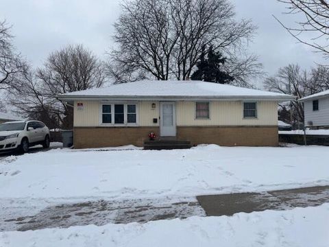 Photo of 7711 W Mill Rd, Milwaukee, WI 53218 (MLS # 1949191)
