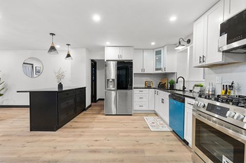 Photo of W156N8813 Pilgrim Rd, Menomonee Falls, WI 53051 (MLS # 1952281)