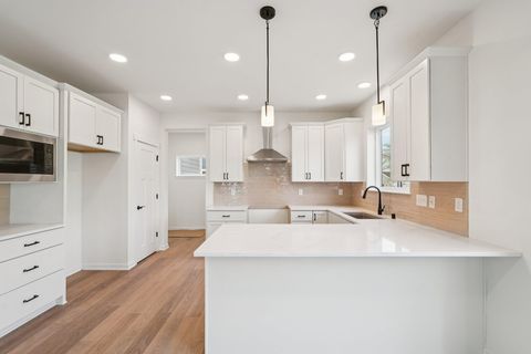 Photo of W149N11973 Red Holly Dr, Germantown, WI 53022 (MLS # 1955974)