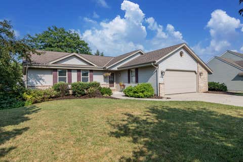 Photo of W145N10546 Heritage Hills Pkwy, Germantown, WI 53022 (MLS # 1973780)