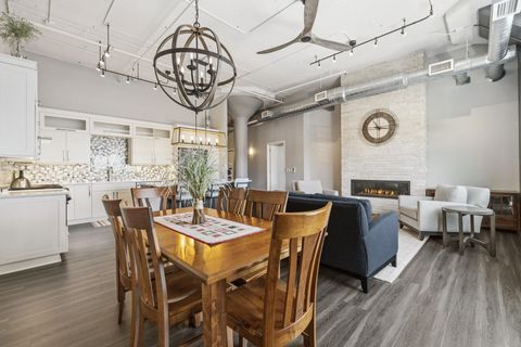 Photo of 705 Village Green Way, West Bend, WI 53090 (MLS # 1957345)