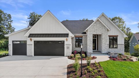 Photo of N66W21443 Sagebrush Dr, Menomonee Falls, WI 53051 (MLS # 1942648)