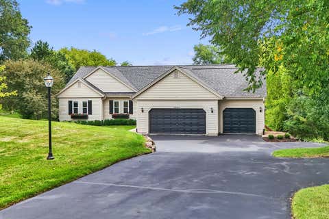 Photo of S28W30753 Wild Berry Ln, Genesee, WI 53188 (MLS # 1975077)