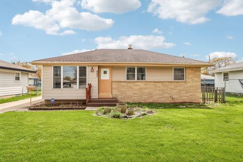 Photo of 8221 W Carmen Ave, Milwaukee, WI 53218 (MLS # 1959657)